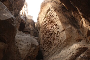 Rock face carvings in a canyon