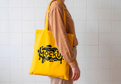 Tote bag worn in minimalist interior