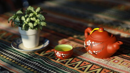 The teapot and teacups were already filled.