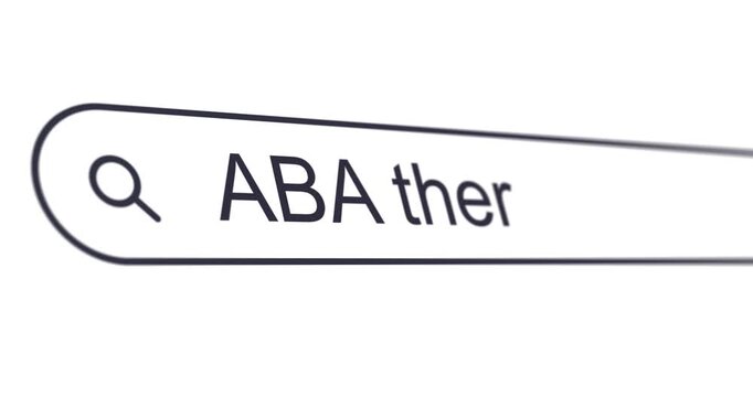 Typing word aba therapy into search box, looking information about ABA for people with autism and developmental disorders, search bar close-up, footage