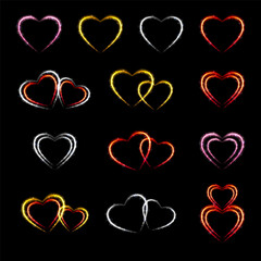 Set of neon transparent glowing heart shaped with glowing lights, isolated on black background.