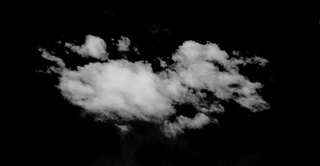 White clouds against a black background.	