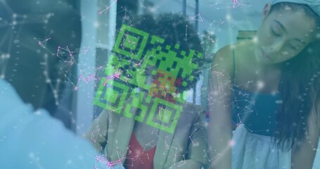Animation of qr code over diverse business people having meeting at office - Powered by Adobe