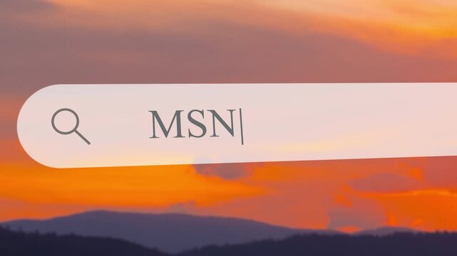 User types in search term on address bar to find information. The scene shows a sunset view over mountains and water, creating a warm backdrop for the search.