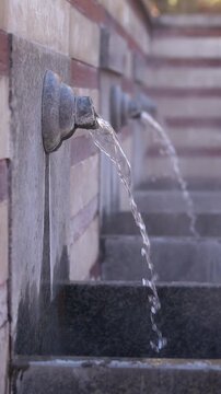 Public mineral hot water fountains. Ancient hot springs in the center of Sofia, Bulgaria. Hot mineral water source available to everyone. One of many springs in Sofia, Serdika district. Healing water