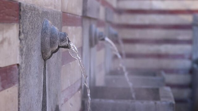 Public mineral hot water fountains. Ancient hot springs in the center of Sofia, Bulgaria. Hot mineral water source available to everyone. One of many springs in Sofia, Serdika district. Healing water