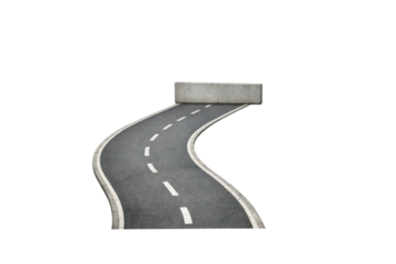 A winding road leads to a concrete barrier, creating a sharp endpoint that alters the path ahead.