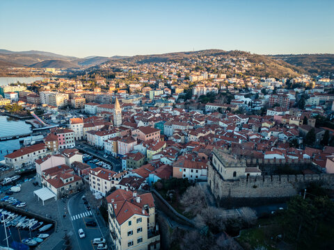 Muggia and its gulf. Historic center seen from above.