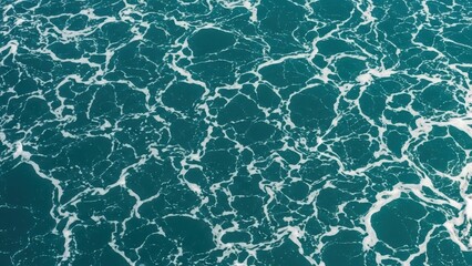 Obraz premium Aerial View of Turquoise Sea Water with White Foam Patterns
