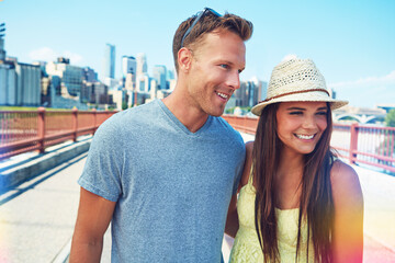 Obraz premium Travel, love or couple on bridge with smile, sightseeing and bonding together on urban vacation. Happy, outdoor or people in city with connection, romantic moment or tourist satisfaction in Australia