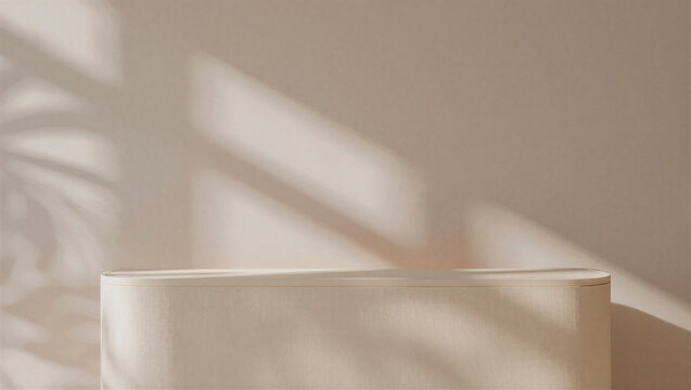 Soft beige background with shadows and palm frond silhouette in natural light