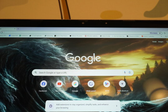 Google Chrome browser displaying a dramatic stormy ocean wallpaper and search bar