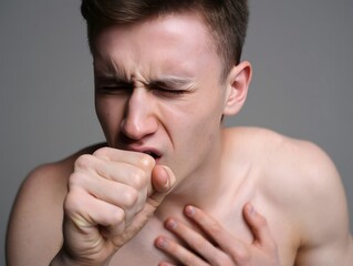 Fototapeta premium Man Experiencing a Severe Coughing Fit, Close-up Portrait