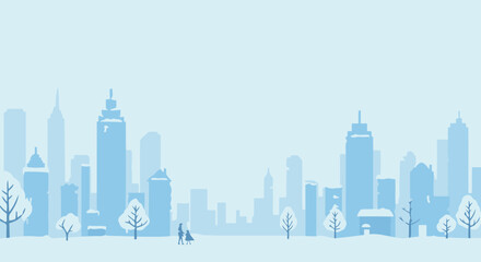 Fototapeta premium Silhouetted couple walking in winter snow with city skyline backdrop.