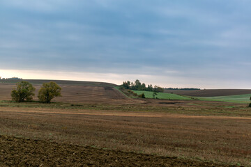 Countryside landscape with sky and fields, real life photo