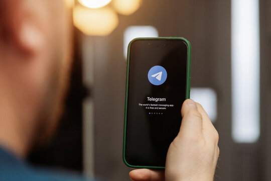 iPhone display with Telegram messaging and audio calling app