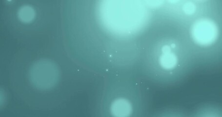 Animation of light spots moving on green background - Powered by Adobe