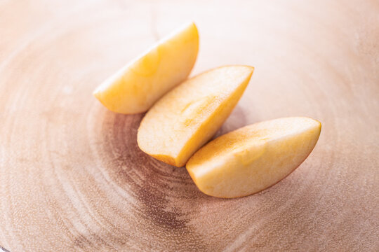 Sliced ​​apple on a counter, top view.