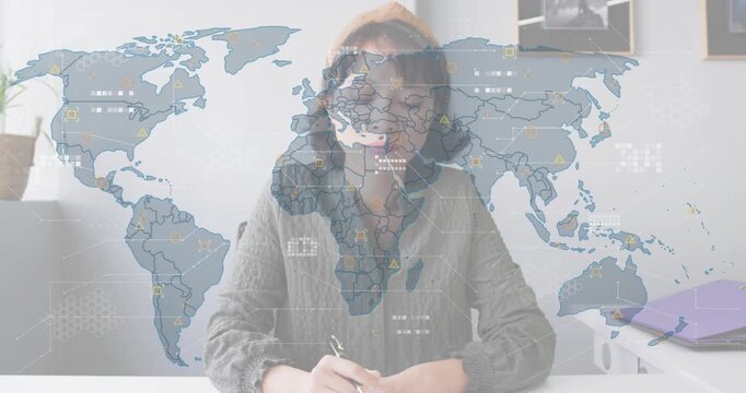Business analyst starting note writing and fading world map overlay, animating icons for insights