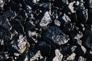 Construction of a new paved highway with sidewalks, lighting and road fencing