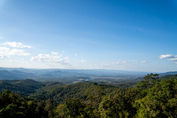 Green mountain landscape under blue sky with scenic viewpoint symbolizing freedom, travel, relaxation and deep connection with nature, 4k video footage
