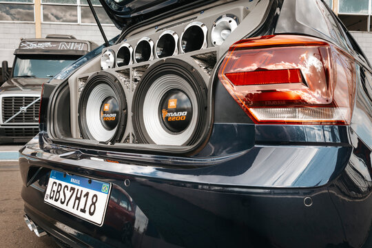Trunk equipped with a high-power automotive sound system, JBL Tornado 2200 subwoofers, horns, and acoustic ports.