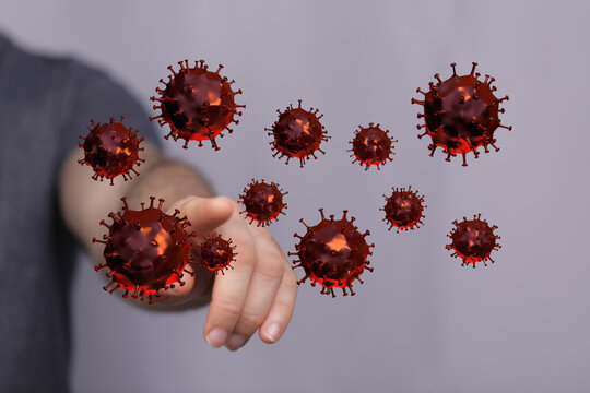 Image depicting the concept of a person interacting with and pointing at 3D rendered virus cells. Illustrative