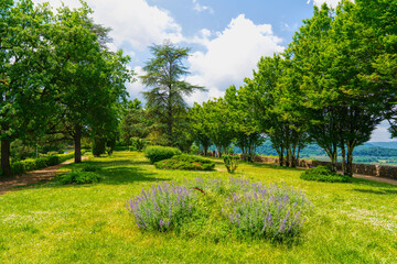 Colourful flowers in park Domme Historic Town, Nouvelle-Aquitaine Dordogne Valley, France