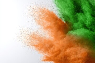 Fototapeta premium Dynamic explosion of orange and green powder on white background
