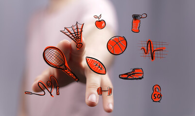 An engaging image depicting a hand interacting with a vibrant array of hand-drawn digital sports and fitness icons, symbolizing health and activ