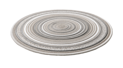 Round woven rug with concentric circles creating a textured pattern, providing an aesthetic floor covering and a minimalist home decor element on a transparent background