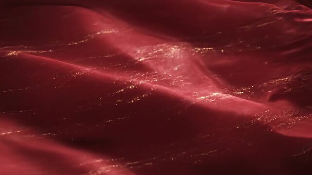 Abstract red fluid surface waving motion close up texture