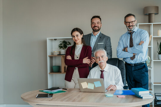 Multi-Generational Family Business Team Portrait in Modern Office &ndash; Smiling Expression