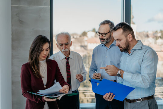 Multi-Generational Business Team Working Together in Modern Office &ndash; Mixed Generations