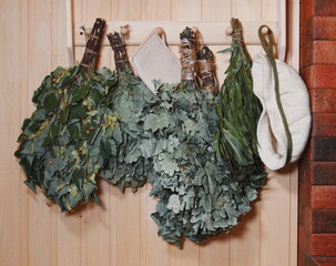 Sauna Venik Herbal Rustic Flatlay Green. Traditional Bathhouse Interior Overhead Warm