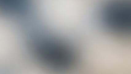Blurred abstract background with soft gray and white gradient colors