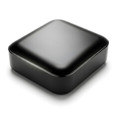 A smooth, glossy black square electronic device with rounded corners sits on a white surface casting a soft shadow