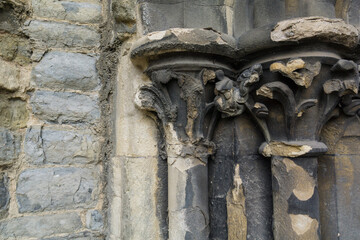 Old stone wall and carving