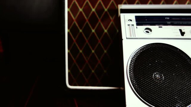 A vintage boombox ghetto blaster from 1985. Shot from a motorized slider. Some color corrections made.