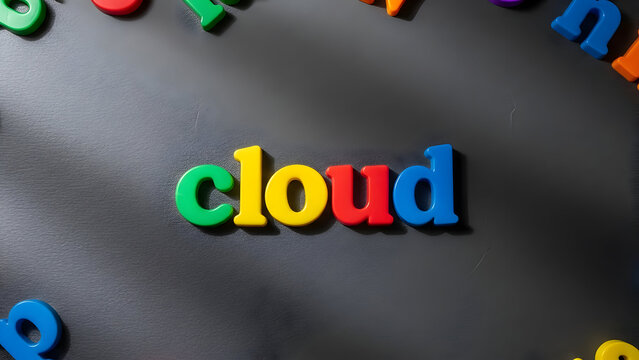 Colorful magnetic letters spell out the word cloud on a black surface, ideal for illustrating educational concepts and technology in a fun way. - Powered by Adobe
