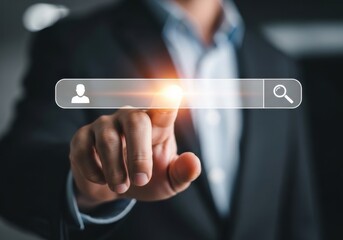 Businessman in a suit touching a glowing search bar interface with a cursor icon and magnifying glass symbol