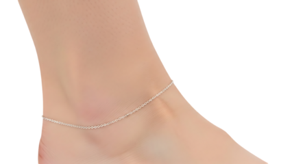 Delicate silver anklet on a woman's ankle