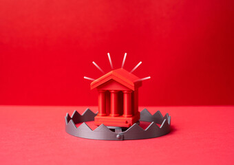 The Red Bank as bait in a trap. A threat to the banking system, bank failure, and money laundering. Financial instability concept, systemic risk signals