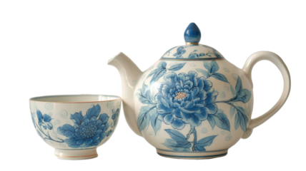 A traditional white porcelain chinese tea set featuring a ceramic pot and cup as isolated kitchen dishware objects for a hot beverage ceremony in China