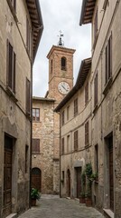 Fototapeta premium Medieval village alley with stone buildings and clock tower
