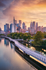Philadelphia, Pennsylvania, USA. Cityscape image of downtown Philadelphia, Pennsylvania and Schuylkill River leading to the city at beautiful autumn sunrise.