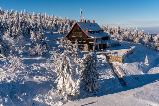 Mountain Shelter on St&oacute;g Izerski in the winter landscape