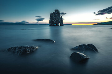 Hvitserkur, Troll Rock on a black lava beach. A natural basalt rock formation shaped like an elephant or mammoth , Northwestern Region, Iceland. Long exposure