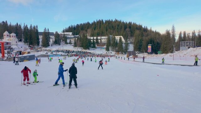 Jahorina, Bosnia and Herzegovina &ndash; January 14, 2026: Children and beginners learning to ski at the Poljice ski school area on Jahorina mountain