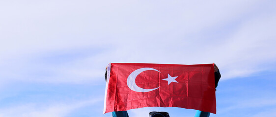 A mountaineer unfurled the Turkish flag at the summit.